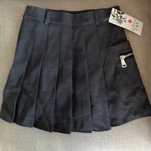 Grey pleated mini skirt runs more like xxs, black shorts underneath. New.